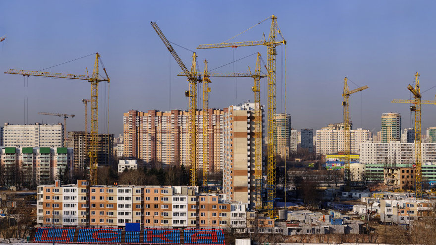 Строительство жилого дома московской области. Стройка панорама. Стройка в городе. Строящийся город в России. Здания массового строительства.